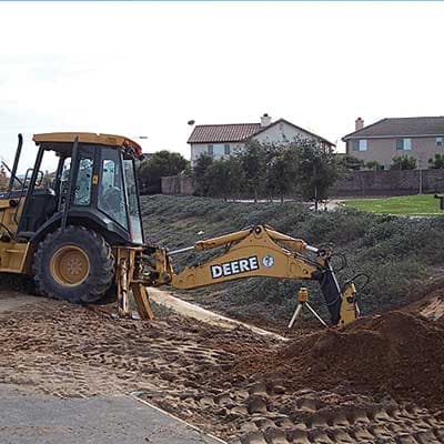 Branding banner for Mike's Grading & Backhoe Service